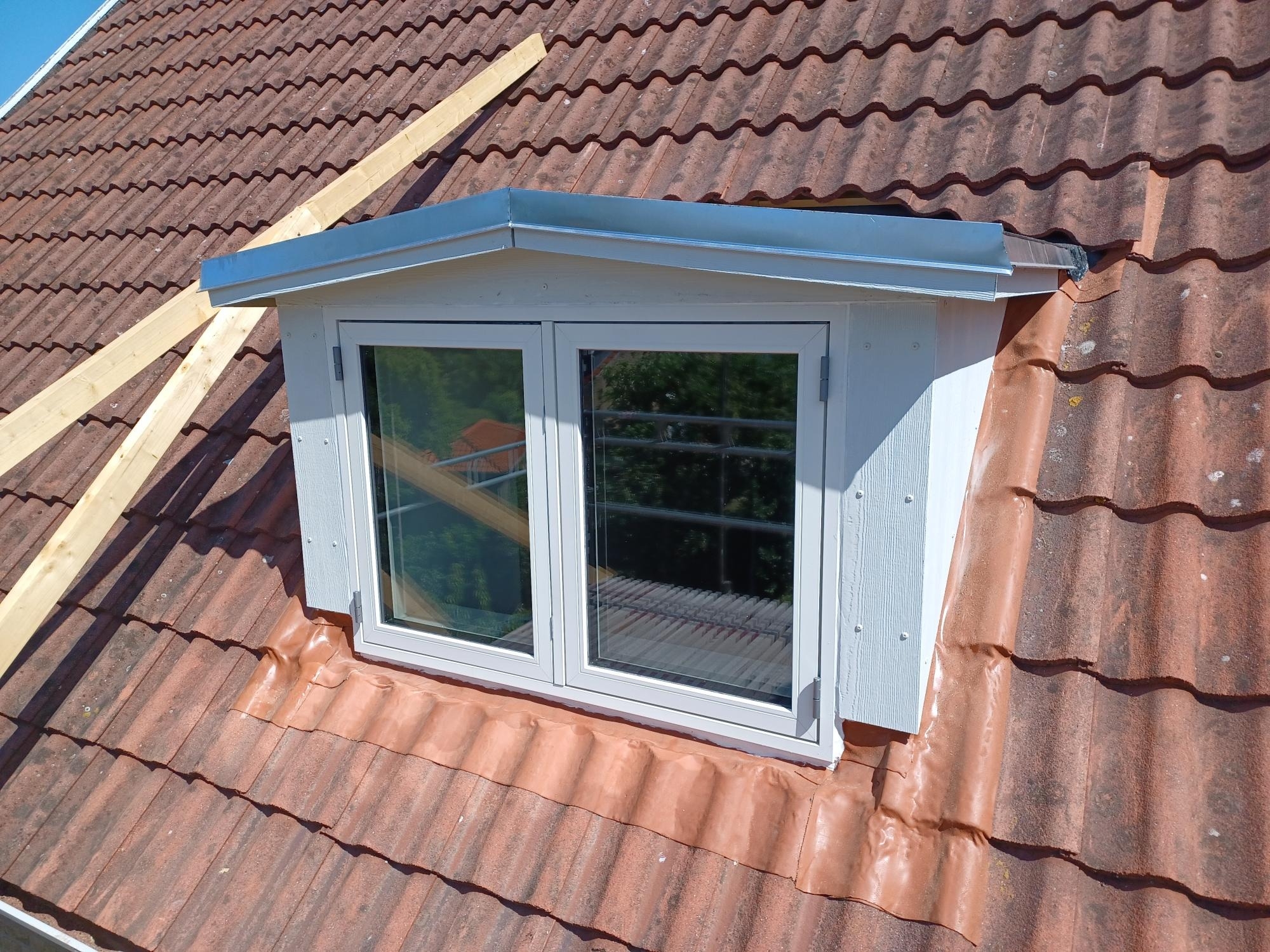 nyt tag tagrenovering vinduer og døre